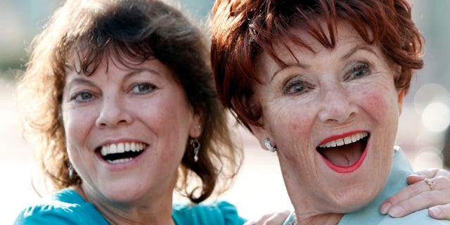 FILE - In this June 18, 2009 file photo, actresses Erin Moran, left, and Marion Ross pose together at the Academy of Television Arts and Sciences' "A Father's Day Salute to TV Dads" in the North Hollywood section of Los Angeles.