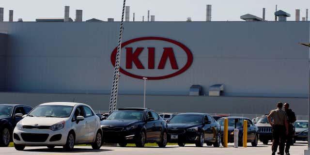 April 21, 2015: Authorities investigate after a shooting at a Kia Motors automobile plant