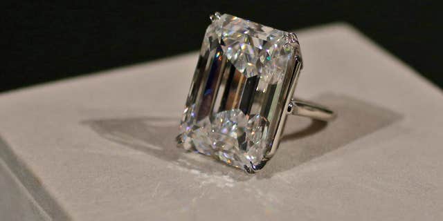 April 17, 2015: A 100-carat emerald-cut diamond is on display at Sotheby's.
