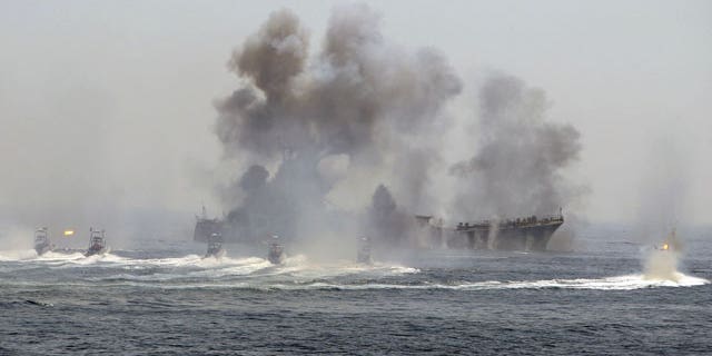 Revolutionary Guard's war game in the Persian Gulf, Iran, Thursday, April 22, 2010. Iran's elite Revolutionary Guard started large-scale war games in the Persian Gulf and the strategic Strait of Hormuz, state television reported. Iran has been holding military maneuvers in the gulf and the Strait of Hormuz annually since 2006 to show off its military capabilities.
