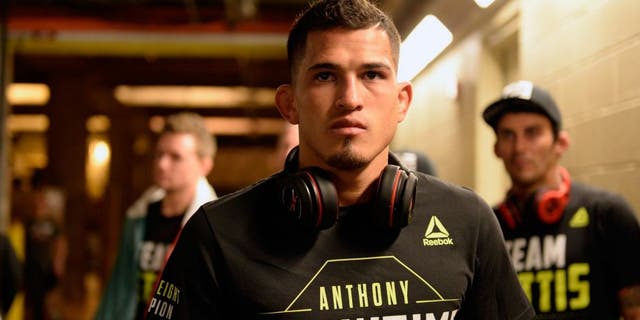 DALLAS, TX - MARCH 14: UFC lightweight champion Anthony Pettis warms up backstage before facing Rafael dos Anjos of Brazil in their UFC lightweight championship bout during the UFC 185 event at the American Airlines Center on March 14, 2015 in Dallas, Texas. (Photo by Mike Roach/Zuffa LLC/Zuffa LLC via Getty Images)