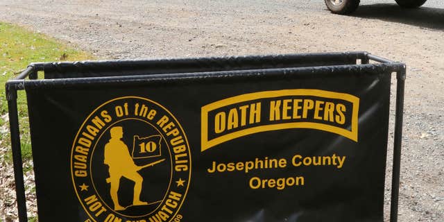 April 14, 2015: An Oath Keepers, constitutional activists, sign marks the entrance to a property on Camp Joy Road near Merlin, Ore