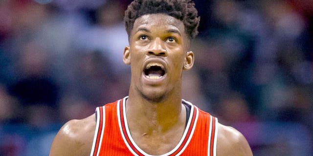 Apr 23, 2015; Milwaukee, WI, USA; Chicago Bulls guard Jimmy Butler (21) reacts after making a basket during the third quarter against the Milwaukee Bucks in game three of the first round of the NBA Playoffs at BMO Harris Bradley Center. Mandatory Credit: Jeff Hanisch-USA TODAY Sports