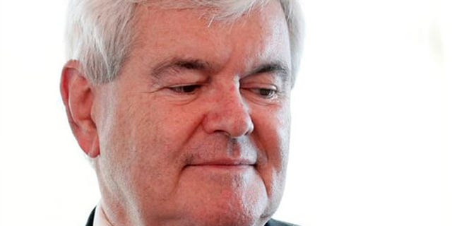 FILE -- April 12, 2012: Newt Gingrich pauses after a being a guest on a radio interview in the Hollywood Diner in Dover, Del.