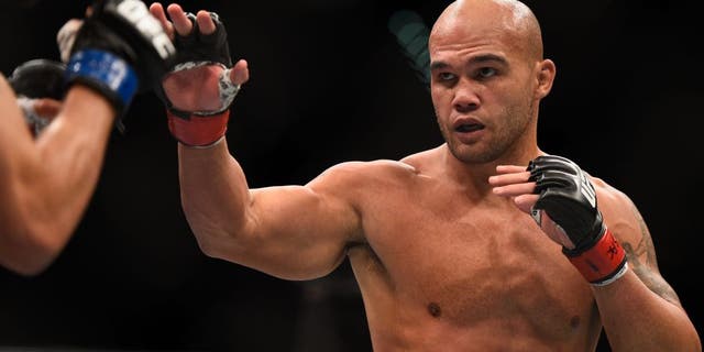 LAS VEGAS, NV - JANUARY 02: (R-L) Robbie Lawler faces off against his opponent in their UFC welterweight championship bout during the UFC 195 event inside MGM Grand Garden Arena on January 2, 2016 in Las Vegas, Nevada. (Photo by Jeff Bottari/Zuffa LLC/Zuffa LLC via Getty Images)