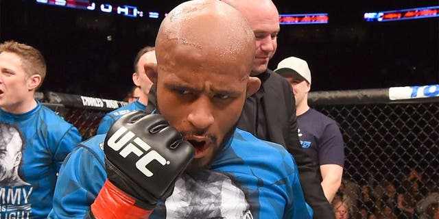 MONTREAL, QC - APRIL 25: Demetrious Johnson of the United States reacts after his submission victory over Kyoji Horiguchi of Japan in their UFC flyweight championship bout during the UFC 186 event at the Bell Centre on April 25, 2015 in Montreal, Quebec, Canada. (Photo by Josh Hedges/Zuffa LLC/Zuffa LLC via Getty Images)