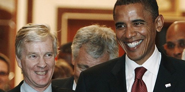 U.S. Democratic presidential candidate Barack Obama (R) and U.S. ambassador to Iraq Ryan Crocker smile as they walk out from the office of Iraqi Prime Minister Nuri al-Maliki after a meeting in Baghdad in this July 21, 2008 file photo.