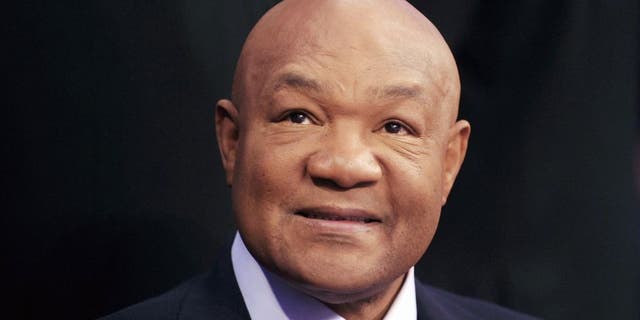 Former two-time world heavyweight champion George Foreman smiles during the 'Fists of Gold' boxing event in Macau on April 6, 2013. AFP PHOTO / Dale de la Rey (Photo credit should read DALE de la REY/AFP/Getty Images)