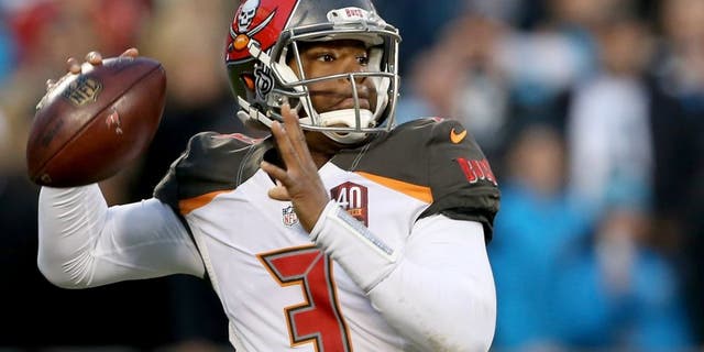 during their game at Bank of America Stadium on January 3, 2016 in Charlotte, North Carolina.,CHARLOTTE, NC - JANUARY 03: Jameis Winston #3 of the Tampa Bay Buccaneers during their game at Bank of America Stadium on January 3, 2016 in Charlotte, North Carolina. (Photo by Streeter Lecka/Getty Images)