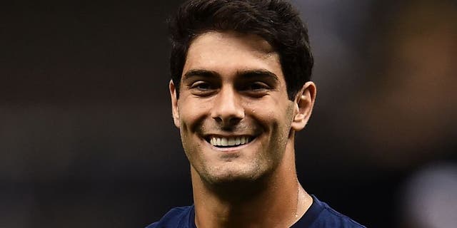 NEW ORLEANS, LA - AUGUST 22: Jimmy Garoppolo #10 of the New England Patriots participates in warmups prior to a preseason game against the New Orleans Saints at the Mercedes-Benz Superdome on August 22, 2015 in New Orleans, Louisiana. (Photo by Stacy Revere/Getty Images)