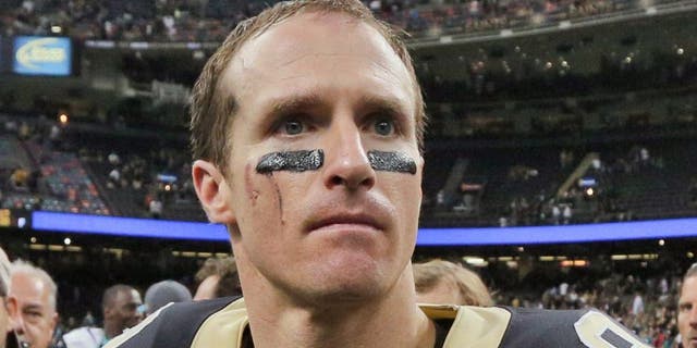Dec 27, 2015; New Orleans, LA, USA; New Orleans Saints quarterback Drew Brees (9) reacts after defeating the Jacksonville Jaguars at the Mercedes-Benz Superdome. The Saints defeated the Jaguars 38-27. Mandatory Credit: Derick E. Hingle-USA TODAY Sports