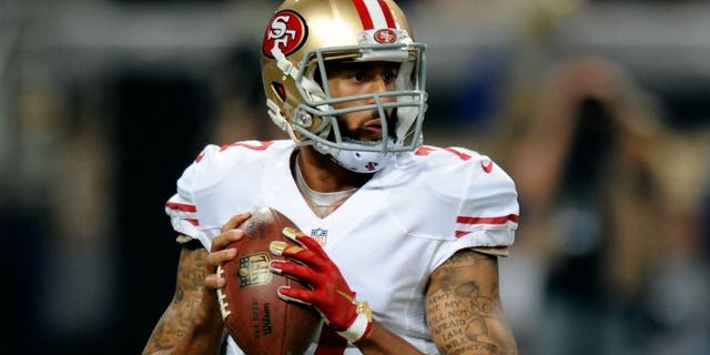 ST. LOUIS, MO - NOVEMBER 1: Colin Kaepernick #7 of the San Francisco 49ers looks to pass against the St. Louis Rams in the first quarter at the Edward Jones Dome on November 1, 2015 in St. Louis, Missouri. (Photo by Michael B. Thomas/Getty Images)