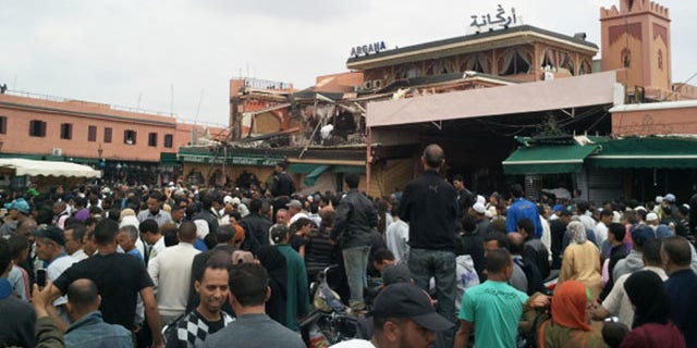 April 28: A crowd congregates outside a cafe in Marrakech. Morocco.