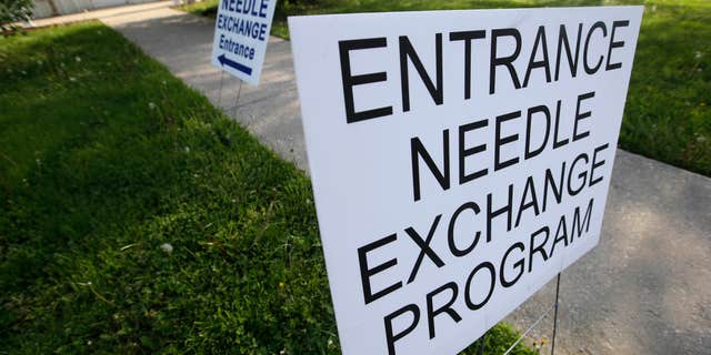 April 21, 2015: Signs are displayed for the needle exchange program at the Austin Community Outreach Center.