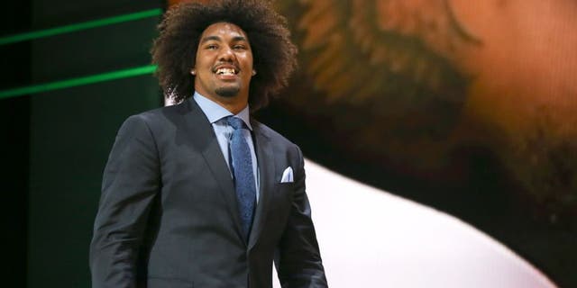CHICAGO, IL - APRIL 30: Leonard Williams of the USC Trojans walks on stage after being chosen #6 overall by the New York Jets during the first round of the 2015 NFL Draft at the Auditorium Theatre of Roosevelt University on April 30, 2015 in Chicago, Illinois. (Photo by Jonathan Daniel/Getty Images)