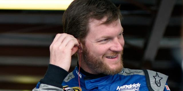 during practice for the NASCAR Sprint Cup Series GEICO 500 at Talladega Superspeedway on April 29, 2016 in Talladega, Alabama.,TALLADEGA, AL - APRIL 29: Dale Earnhardt Jr, driver of the #88 Nationwide Chevrolet, stands in the garage area during practice for the NASCAR Sprint Cup Series GEICO 500 at Talladega Superspeedway on April 29, 2016 in Talladega, Alabama. (Photo by Jared C. Tilton/Getty Images)