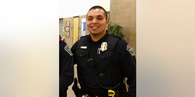 FILE - This Jan. 8, 2013, file photo, provided by Christian Dobratz shows St. Anthony policer Officer Jeronimo Yanez outside the city council chambers in St. Anthony, Minn. The Minnesota Bureau of Criminal Apprehension has been investigating the shooting by Yanez. The agency said Wednesday, Sept. 28, 2016, that it turned over its findings to prosecutors. (Christian Dobratz via AP, File)