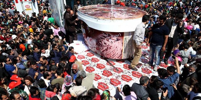 5-tons of ice-cream made by Iranian Choopan dairy is displayed during a ceremony at the Tochal mountainous area of northern Tehran, Iran.