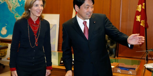 New U.S. Ambassador to Japan Caroline Kennedy is greeted by Japanese Defense Minister Itsunori Onodera at the start of their meeting at Japan's Defense Ministry in Tokyo, Thursday, Nov. 21, 2013. (AP Photo/Shizuo Kambayashi)