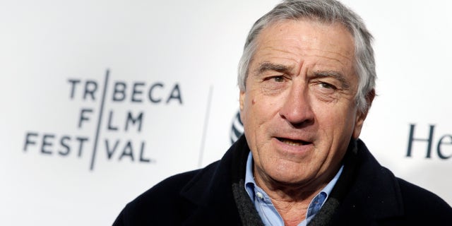 April 16, 2014. Robert De Niro poses on the red carpet upon arriving for the 2014 Tribeca Film Festival opening night in New York.