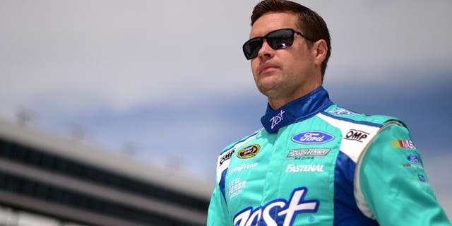 FORT WORTH, TEXAS - APRIL 08: Ricky Stenhouse Jr., driver of the #17 Zest Ford, walks on the grid during qualifying for the NASCAR Sprint Cup Series Duck Commander 500 at Texas Motor Speedway on April 8, 2016 in Fort Worth, Texas. (Photo by Jared C. Tilton/NASCAR via Getty Images)