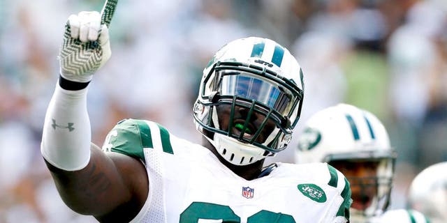 EAST RUTHERFORD, NJ - SEPTEMBER 07: (NEW YORK DAILIES OUT) Muhammad Wilkerson #96 of the New York Jets in action against the Oakland Raiders on September 7, 2014 at MetLife Stadium in East Rutherford, New Jersey. The Jets defeated the Raiders 19-14. (Photo by Jim McIsaac/Getty Images) *** Local Caption *** Muhammad Wilkerson