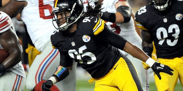PITTSBURGH, PA - AUGUST 10: Linebacker Jarvis Jones #95 of the Pittsburgh Steelers pursues running back Andre Brown #35 of the New York Giants during a preseason game at Heinz Field on August 10, 2013 in Pittsburgh, Pennsylvania. The Giants defeated the Steelers 18-13. (Photo by George Gojkovich/Getty Images)