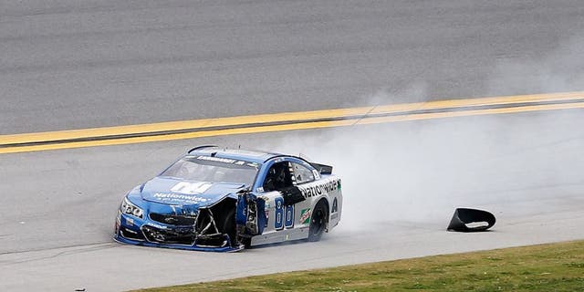 TALLADEGA, AL - MAY 01: Dale Earnhardt Jr, driver of the #88 Nationwide Chevrolet, drives on the apron after an on track incident during the NASCAR Sprint Cup Series GEICO 500 at Talladega Superspeedway on May 1, 2016 in Talladega, Alabama. (Photo by Brian Lawdermilk/Getty Images)