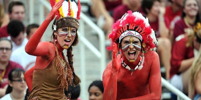 Sept 8, 2012; Tallahassee, Florida, USA; Florida State Seminoles fans cheer during the game against the Savannah State Tigers at Doak Campbell Stadium. Mandatory Credit: Melina Vastola-USA TODAY Sports