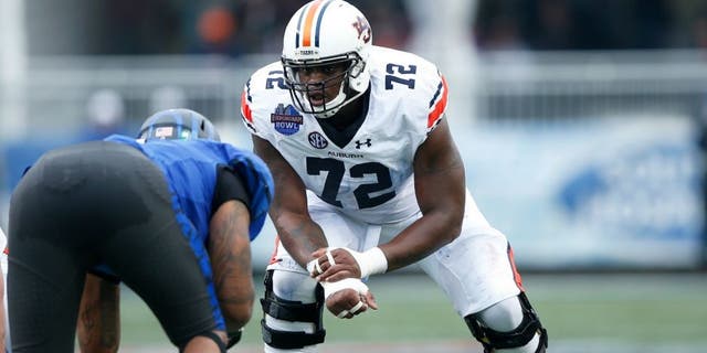 BIRMINGHAM, AL - DECEMBER 30: Shon Coleman #72 of the Auburn Tigers in action against the Memphis Tigers during the Birmingham Bowl at Legion Field on December 30, 2015 in Birmingham, Alabama. Auburn defeated Memphis 31-10. (Photo by Joe Robbins/Getty Images)