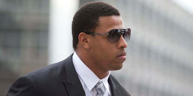 Feb. 9, 2015: Greg Hardy arrives at the Mecklenburg County Courthouse on the first day of his domestic violence appeal trial in Charlotte, N.C.