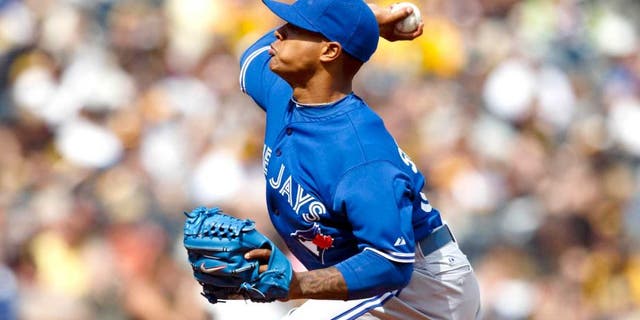 May 4, 2014; Pittsburgh, PA, USA; Toronto Blue Jays relief pitcher Marcus Stroman (54) pitches in the eighth inning against the Pittsburgh Pirates at PNC Park. Mandatory Credit: Rick Osentoski-USA TODAY Sports