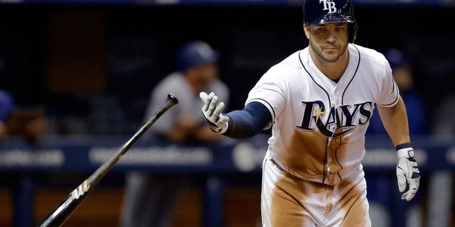 Tampa Bay Rays' Steve Pearce flips his bat after hitting a three-run home run off Los Angeles Dodgers starting pitcher Alex Wood during the sixth inning of an interleague baseball game Wednesday, May 4, 2016, in St. Petersburg, Fla. Rays' Brandon Guyer and Evan Longoria also scored. (AP Photo/Chris O'Meara)