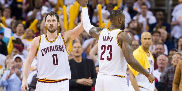 CLEVELAND, OH - APRIL 17: Kevin Love #0 of the Cleveland Cavaliers and LeBron James #23 celebrate during the second half of the NBA Eastern Conference quarterfinals against the Detroit Pistons at Quicken Loans Arena on April 17, 2016 in Cleveland, Ohio. The Cavaliers defeated the Pistons 106-101. NOTE TO USER: User expressly acknowledges and agrees that, by downloading and or using this photograph, User is consenting to the terms and conditions of the Getty Images License Agreement. (Photo by Jason Miller/Getty Images)