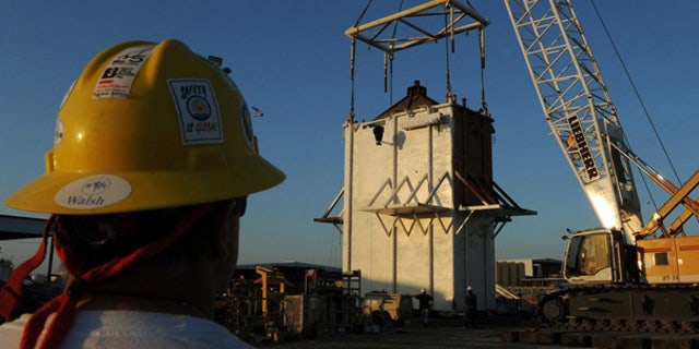 May 4: Workers put the finishing touches on the Pollution Control Dome in Port Fourchon.