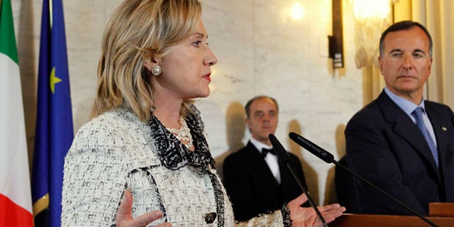 May 5: U.S. Secretary of State Hillary Rodham Clinton, left, speaks to the media with Italy's Foreign Minister Franco Frattini at the Ministry of Foreign Affairs during the Second Contact Group Meeting on Libya, in Rome.