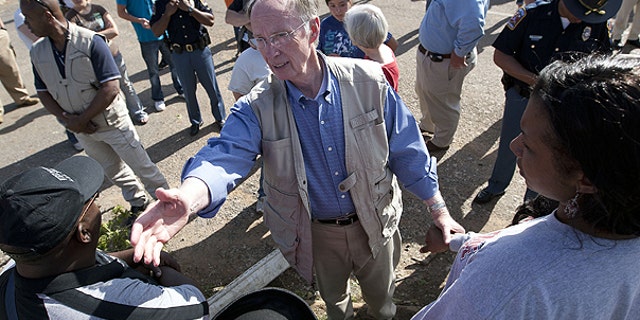 April 28: Alabama Gov. Robert Bentley visits with residents in Tuscaloosa, Ala., who lost their homes in a tornado strike.