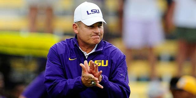 BATON ROUGE, LA - SEPTEMBER 07: Les Miles, head coach of the LSU Tigers, watches his team during warmups prior to a game at Tiger Stadium against the UAB Blazers on September 7, 2013 in Baton Rouge, Louisiana. LSU won the game 56-17. (Photo by Stacy Revere/Getty Images)