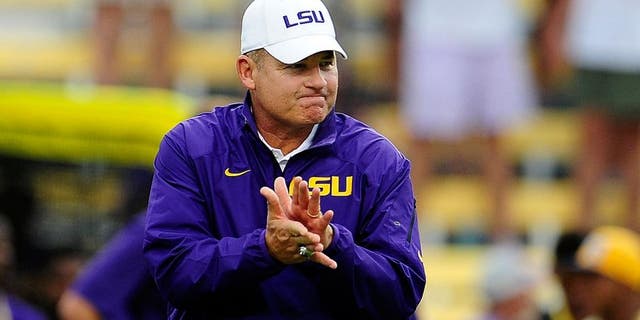 BATON ROUGE, LA - SEPTEMBER 07: Les Miles, head coach of the LSU Tigers, watches his team during warmups prior to a game at Tiger Stadium against the UAB Blazers on September 7, 2013 in Baton Rouge, Louisiana. LSU won the game 56-17. (Photo by Stacy Revere/Getty Images)