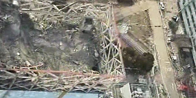 April 10: Image taken by T-Hawk drone aircraft and released by Tokyo Electric Power Co. (TEPCO) shows the damaged reactor building of Unit 1 of the tsunami-crippled Fukushima Dai-ichi nuclear power plant in Okuma, Fukushima Prefecture, northeastern Japan.