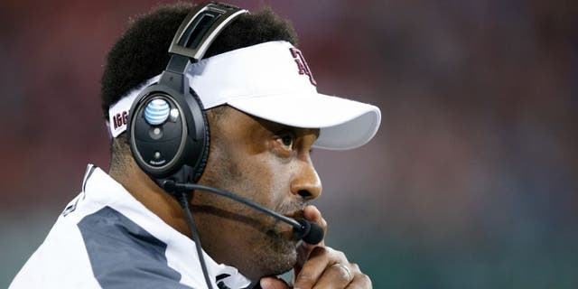 NASHVILLE, TN - DECEMBER 30: Head coach Kevin Sumlin of the Texas A&amp;M Aggies looks on against the Louisville Cardinals during the Franklin American Mortgage Music City Bowl at Nissan Stadium on December 30, 2015 in Nashville, Tennessee. Louisville defeated Texas A&amp;M 27-21. (Photo by Joe Robbins/Getty Images)