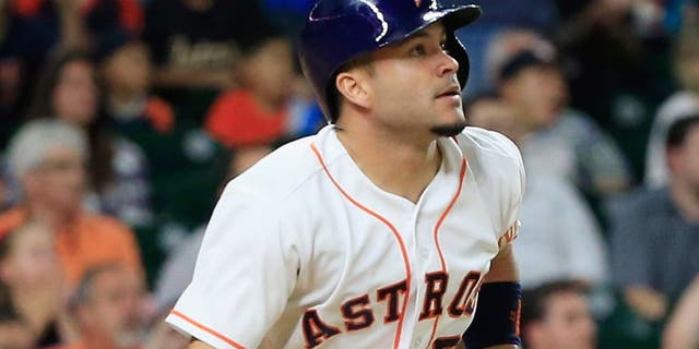 HOUSTON, TX - MAY 04: Jose Altuve #27 of the Houston Astros connects on a two-run double in the fifth inning during their game against the Minnesota Twins at Minute Maid Park on May 4, 2016 in Houston, Texas. (Photo by Scott Halleran/Getty Images)