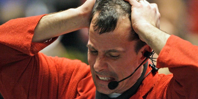 May 6: A trader reacts in the S&P 500 futures pit at the CME Group in Chicago near the close of trading.