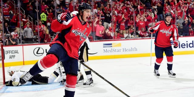 WASHINGTON, DC - MAY 07: T.J. Oshie #77 of the Washington Capitals celebrates his second period goal against the Pittsburgh Penguins in Game Five of the Eastern Conference Second Round during the 2016 NHL Stanley Cup Playoffs at Verizon Center on May 7, 2016 in Washington, DC. (Photo by Patrick McDermott/NHLI via Getty Images)