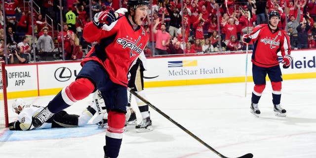 WASHINGTON, DC - MAY 07: T.J. Oshie #77 of the Washington Capitals celebrates his second period goal against the Pittsburgh Penguins in Game Five of the Eastern Conference Second Round during the 2016 NHL Stanley Cup Playoffs at Verizon Center on May 7, 2016 in Washington, DC. (Photo by Patrick McDermott/NHLI via Getty Images)