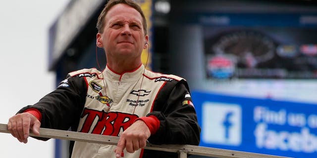 BRISTOL, TN - AUGUST 22: Dave Blaney, driver of the #37 Accell Construction Inc. Chevrolet, stands on top of his team hauler during practice for the NASCAR Sprint Cup Series Irwin Tools Night Race at Bristol Motor Speedway on August 22, 2014 in Bristol, Tennessee. (Photo by Brian Lawdermilk/NASCAR via Getty Images)