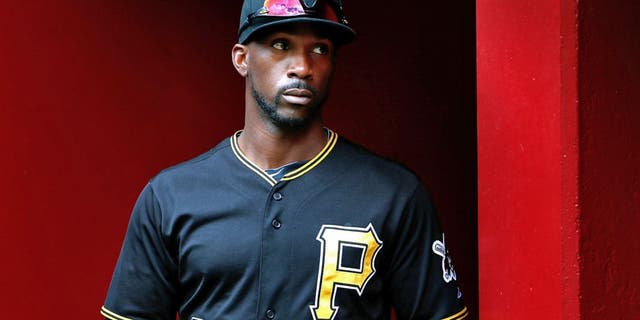 PHOENIX, AZ - APRIL 26: Andrew McCutchen #22 of the Pittsburgh Pirates in the dugout before the MLB game against the Arizona Diamondbacks at Chase Field on April 26, 2015 in Phoenix, Arizona. The Pirates defeated the Diamondbacks 8-0. (Photo by Christian Petersen/Getty Images)