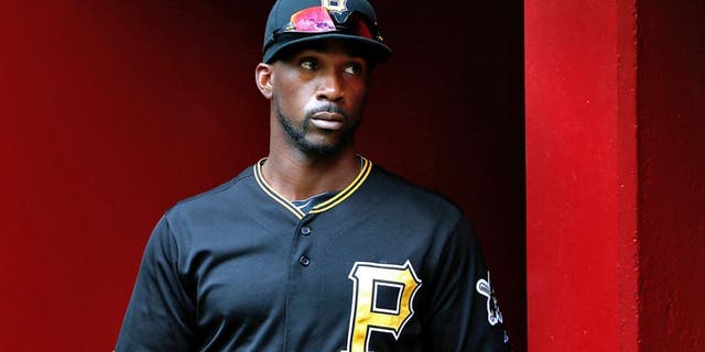 PHOENIX, AZ - APRIL 26: Andrew McCutchen #22 of the Pittsburgh Pirates in the dugout before the MLB game against the Arizona Diamondbacks at Chase Field on April 26, 2015 in Phoenix, Arizona. The Pirates defeated the Diamondbacks 8-0. (Photo by Christian Petersen/Getty Images)