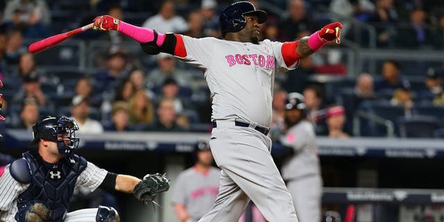 NEW YORK, NY - MAY 08: David Ortiz #34 of the Boston Red Sox connects on a solo home run in the fourth inning against the New York Yankees at Yankee Stadium on May 8, 2016 in the Bronx borough of New York City. (Photo by Mike Stobe/Getty Images)