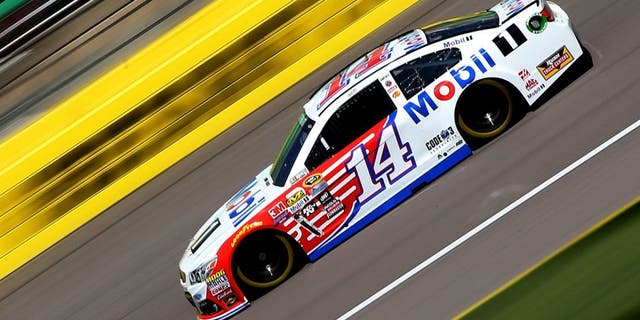 KANSAS CITY, KS - MAY 06: Tony Stewart, driver of the #14 Mobil 1 Chevrolet, drives during practice for the NASCAR Sprint Cup Series Go Bowling 400 at Kansas Speedway on May 6, 2016 in Kansas City, Kansas. (Photo by Sean Gardner/NASCAR via Getty Images)